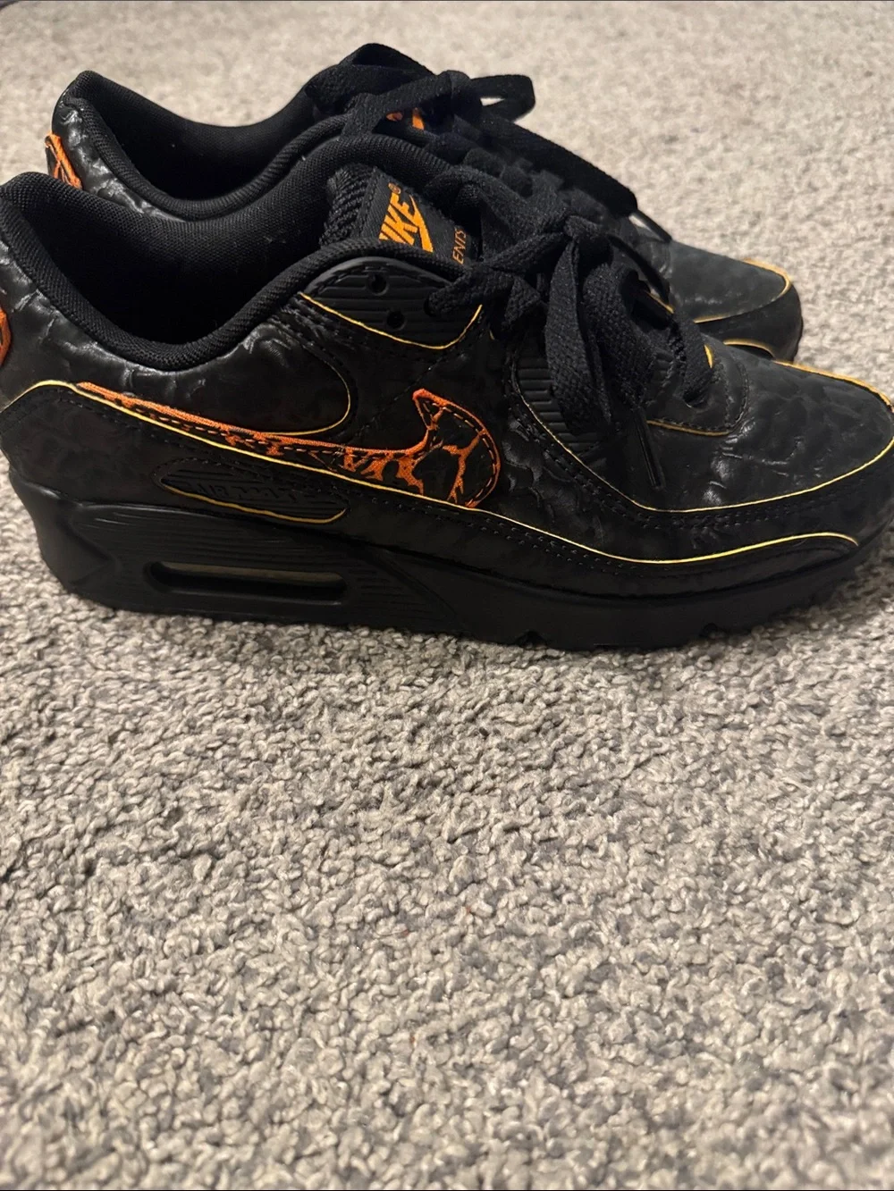 Nike Black Sneakers with Orange Accents